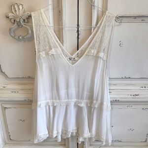 Free people flowy top with lace detail